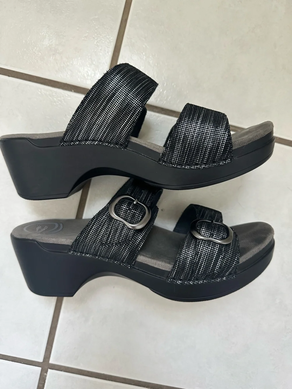 Dansko Wedge Sandals with Buckle. Great shoe but wrong fit for me. Worn twice!